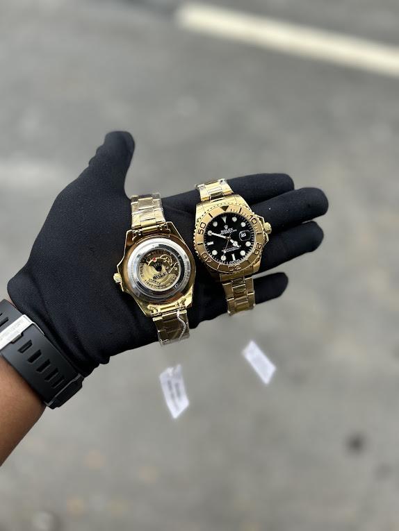Relógio Rolex Primeira Linha Yacht Master no Atacado – Dourado e Preto com Pulseira de Borracha | Relógios Para Revender Relógio Rolex Primeira Linha Yacht Master no Atacado – Dourado e Preto com Pulseira de Borracha