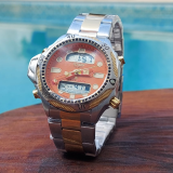 Relógio Citizen C-500 Dourado + Caixa no Atacado – Fundo Laranja | Relógios Para Revender Relógio Citizen C-500 Dourado + Caixa no Atacado – Fundo Laranja