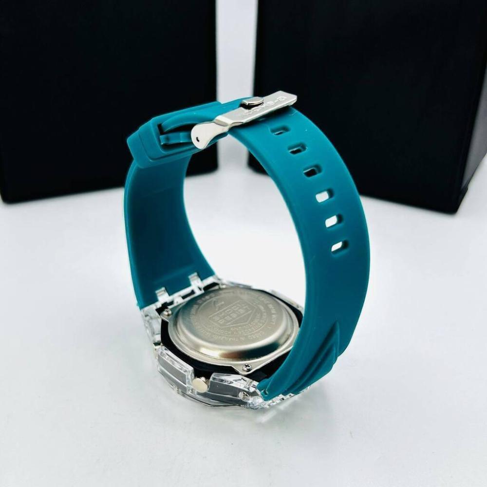 Relógio Gshock WR 20 Bar 2100 Transparente e Verde Petróleo no Atacado – Pulseira Emborrachada | Relógios Para Revender Relógio Gshock WR 20 Bar 2100 Transparente e Verde Petróleo no Atacado – Pulseira Emborrachada