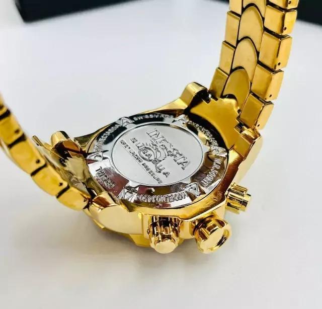 Relógio Invicta Joker Curinga Primeira Linha no Atacado - Dourado com Fundo Branco e Roxo + Caixa + Frete Grátis | Relógios Para Revender Relógio Invicta Joker Curinga Primeira Linha no Atacado – Dourado com Fundo Branco e Roxo + Caixa + Frete Grátis